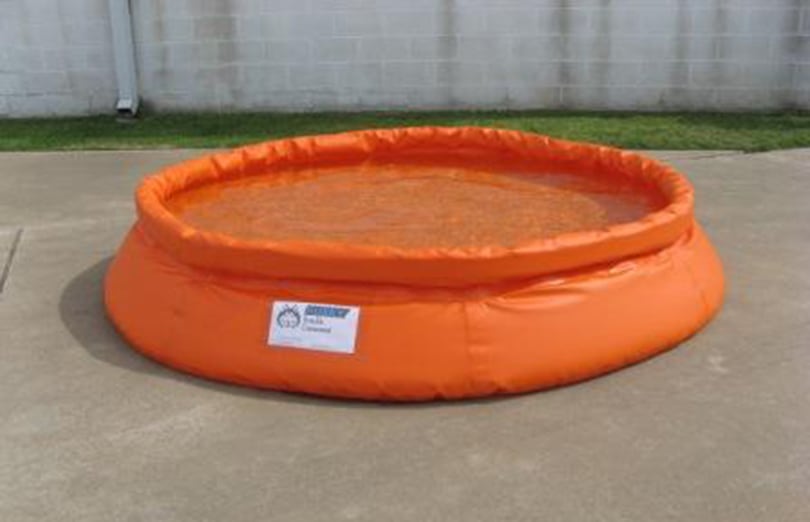 a 250 gallon self rising decon pool by Husky Portable